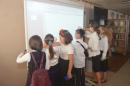 <p>Everybody wants to draw on the interactive whiteboard</p>