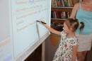 <p>Our interactive whiteboard is fun!</p>